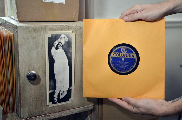 Lon Eldridge with a 1905 Victor V-2 phonograph at his Chattanooga home. Mr Eldridge collects vinyl records and restores phonographs. Thursday Aug 20, 2016 (Photo by Billy Weeks)
