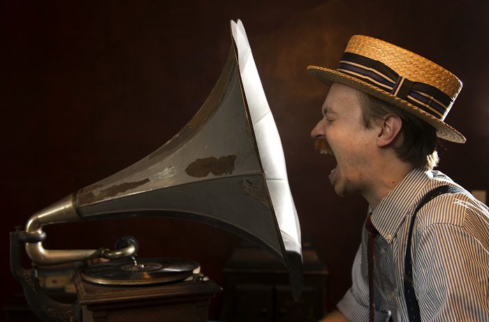 Lon Eldridge with a 1905 Victor V-2 phonograph at his Chattanooga home. Mr Eldridge collects vinyl records and restores phonographs. Thursday Aug 20, 2016 (Photo by Billy Weeks)